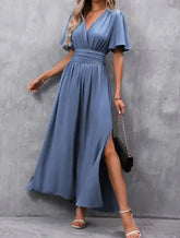 Voguable spring/summer new women's elegant deep V-neck design with slit pleats on both sides and waist cinching long skirt voguable