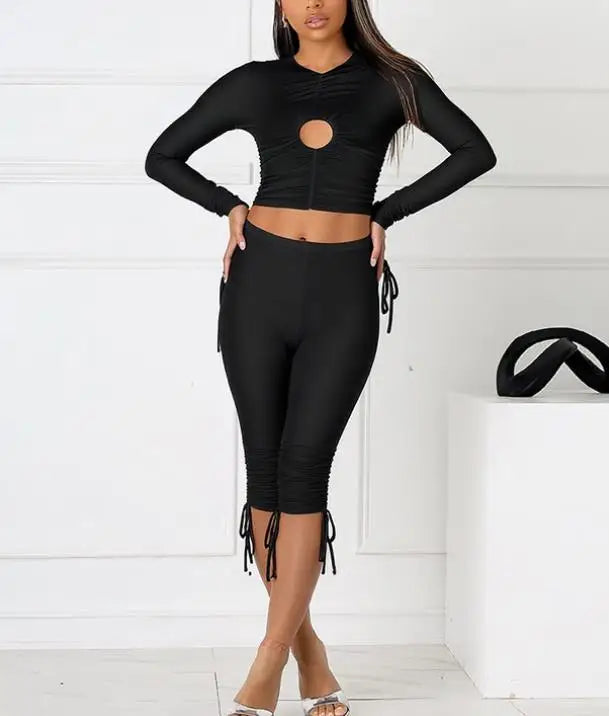 Voguable Women's pullover with hollowed out circular pleats and adjustable drawstring, cropped pants with exposed navel set voguable