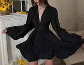 Voguable autumn and winter new style fashionable and elegant temperament solid color long sleeved V-neck top jumpsuit short skirt voguable