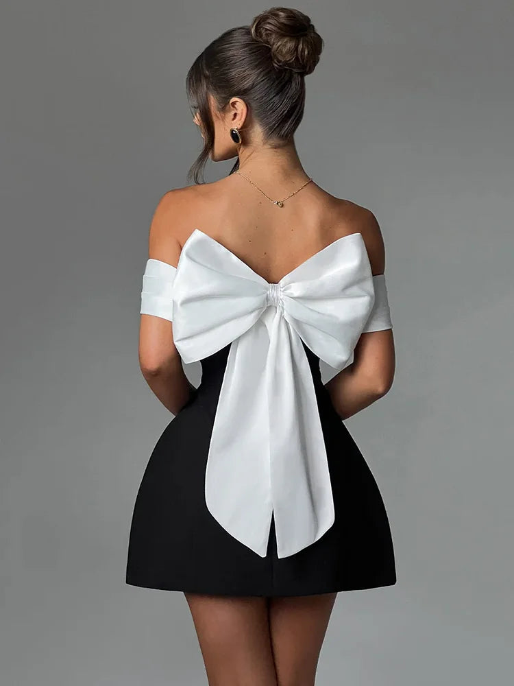 Mozision Bow Backless Sexy Mini Dress For Women Robe Elegant Off-shoulder Strapless Sleeveless A-line Club Sexy Dress Vestido voguable