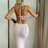 2025 New Pink Knit Sexy Log Dress Hollow Out Halter Neck Backless Chic Vacation Summer Dress Solid Tight Beach Dresses For Women voguable