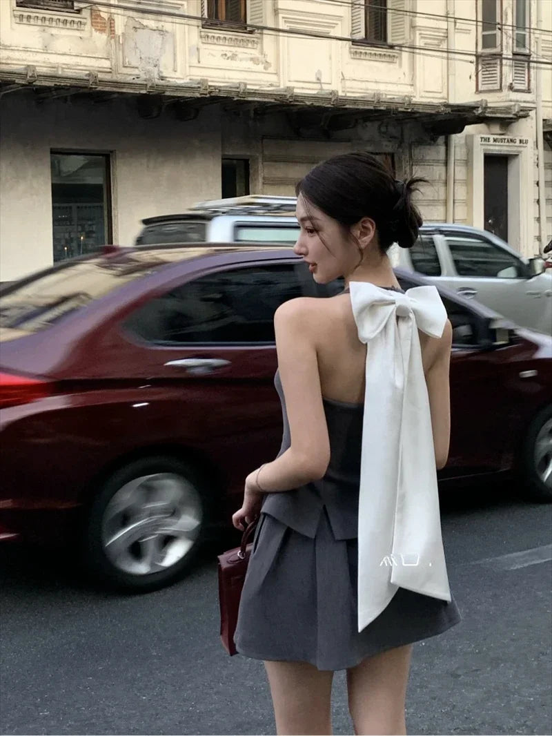 Voguable American Retro Design Feeling Bow Hanging Neck Vest Women's Summer New Suit A-line Short Skirt Two-piece Set Female Clothing voguable