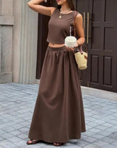 Voguable Spring/Summer New Women's Set Solid Color Fashion Leisure Vacation Style Sleeveless Backless Top Half Skirt Two Piece Set voguable