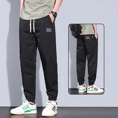 Spring Autumn New Fashion Elastic Waist Solid Men's Clothing Drawstring Pockets American Style Bound Feet Chaopai Casual Pants voguable