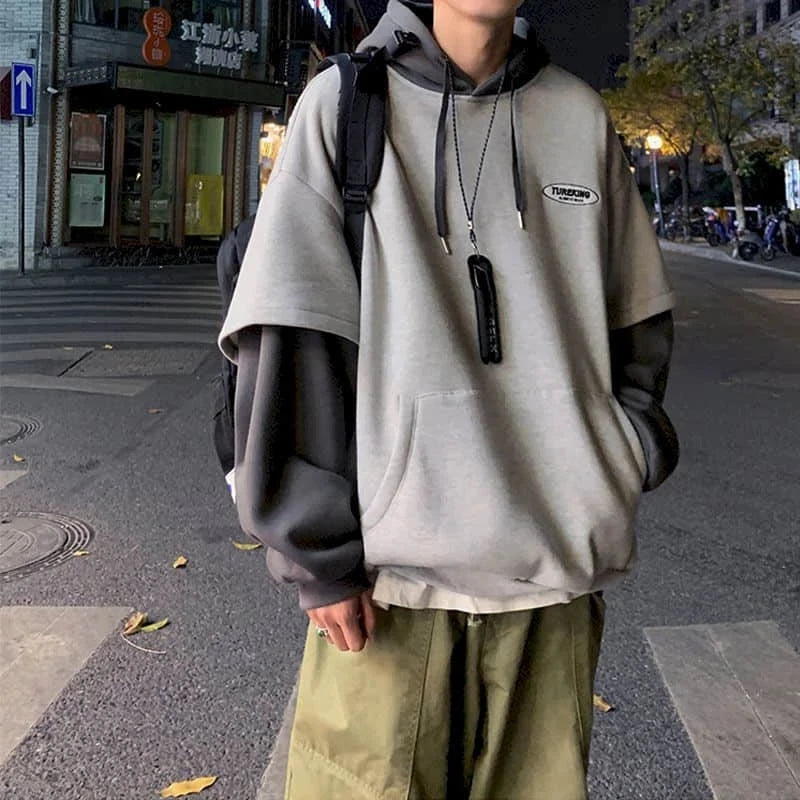 Voguable Hoodies men fake two-piece sweatshirt autumn stitching Korean loose contrast color hooded long-sleeved black white gray design voguable