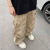 American Style Casual Cargo Pants Men Multi Pocket Loose Quick Drying Waterproof Trousers Male Streetwear Parachute Pants voguable