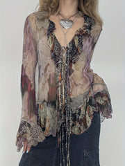 Vintage Printed Mesh T-Shirt with a Fairy-Like Trash Style, Featuring Ruffled Edges, Tie Straps, And Bell Sleeves in a Sheer Design. voguable