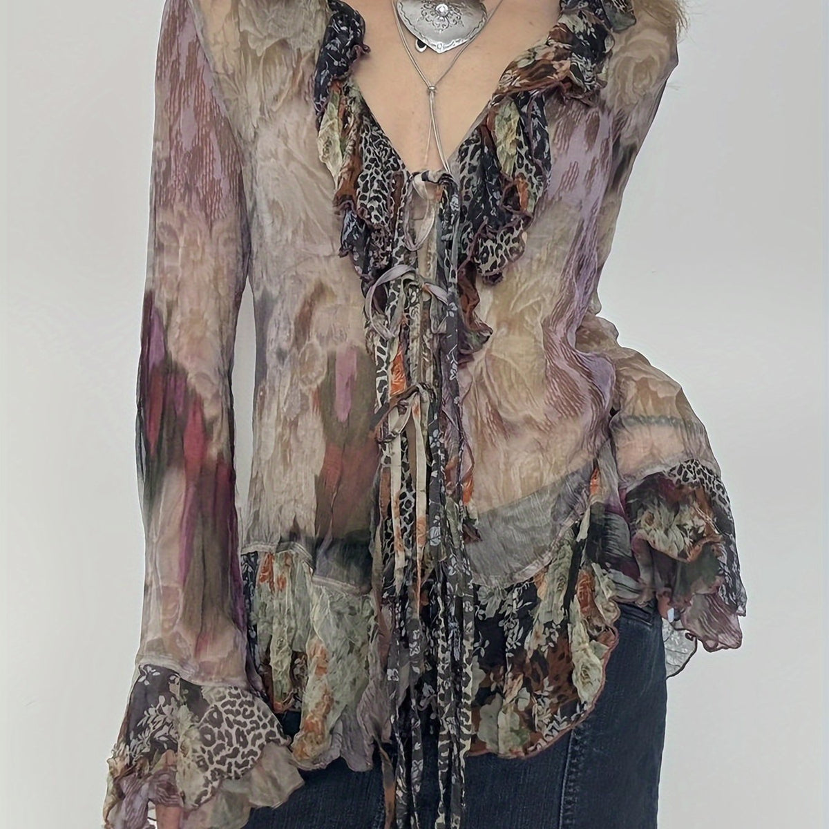 Vintage Printed Mesh T-Shirt with a Fairy-Like Trash Style, Featuring Ruffled Edges, Tie Straps, And Bell Sleeves in a Sheer Design. voguable