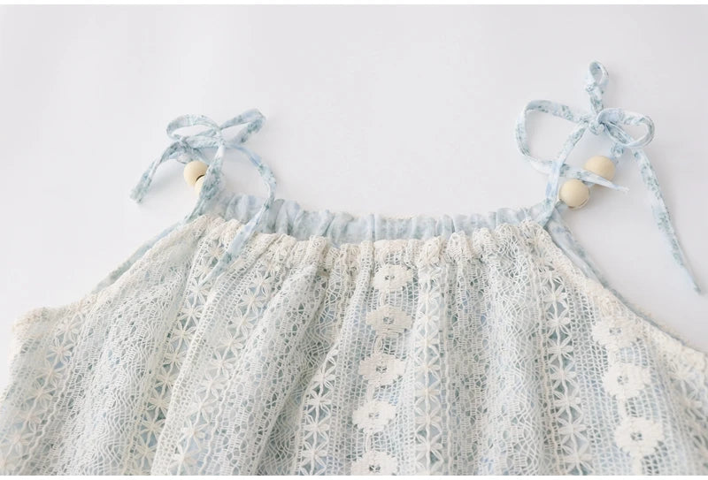 Voguable Women's New French Seaside Resort Style Tassel Lace Suspender Dresses Female Summer Fake Two-piece Mid-length Floral Fairy Dress voguable