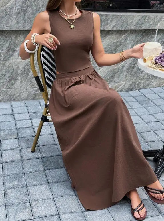 Voguable  Spring/Summer New Women's Set Solid Color Leisure Resort Style Sleeveless Backless Top Half Skirt Two Piece Set voguable