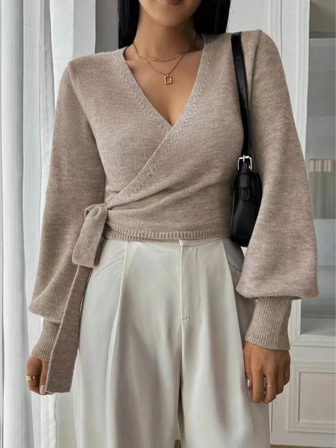 Ladies' autumn and winter fashion solid color V-neck lace up cardigan knitted sweater voguable