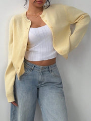 Autumn and winter new simple plain color long sleeved cardigan knitted sweater voguable