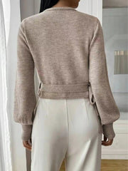 Ladies' autumn and winter fashion solid color V-neck lace up cardigan knitted sweater voguable