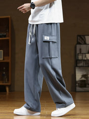 Spring Autumn Multi-Pockets Sweatpants Men Drawstring Waist Sportswear Casual Track Pants Plus Size Loose Straight Trousers 8XL voguable