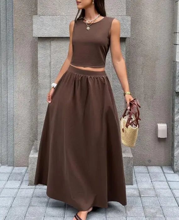 Voguable  Spring/Summer New Women's Set Solid Color Leisure Resort Style Sleeveless Backless Top Half Skirt Two Piece Set voguable