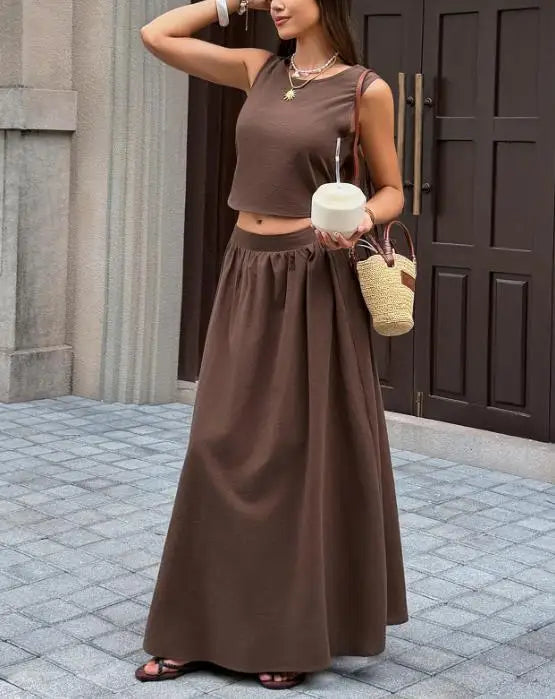 Voguable  Spring/Summer New Women's Set Solid Color Leisure Resort Style Sleeveless Backless Top Half Skirt Two Piece Set voguable